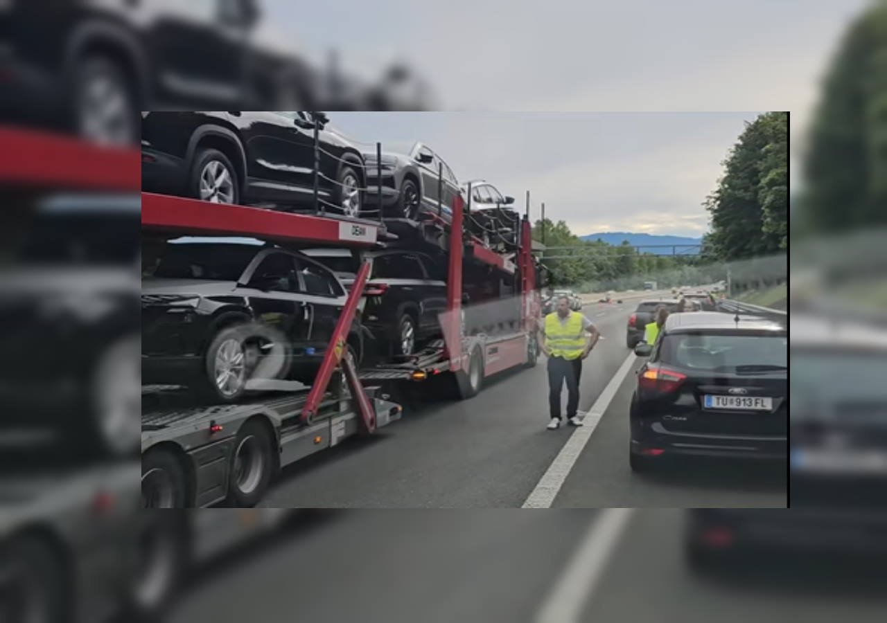 VIDEO: Medtem ko drugi pomagajo, tovornjakar mimo po reševalnem pasu