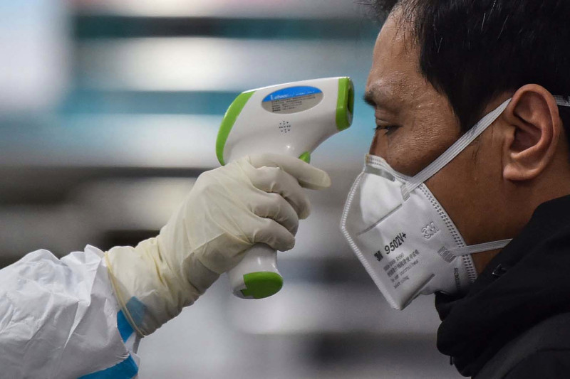 Kitajska brez pojasnila prekinila objavljanje podatkov o epidemiji covida-19